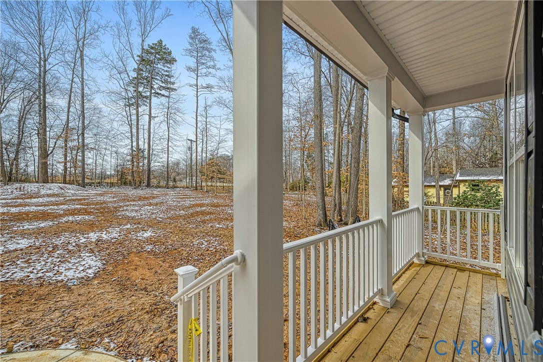 925 Moody Town Road Bumpass, VA 23024 - Photo 3 of 47 a view of a balcony with wooden floor