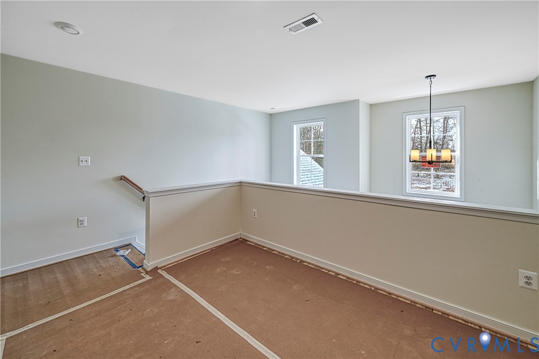 925 Moody Town Road Bumpass, VA 23024 - Photo 31 of 47 a view of an empty room with a window