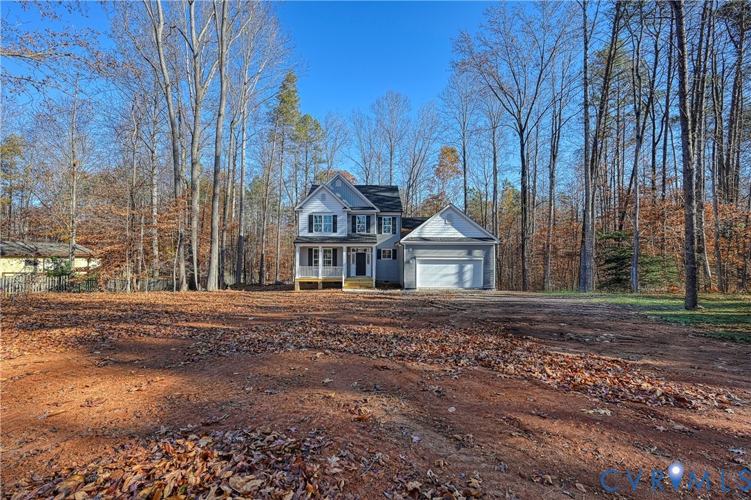 925 Moody Town Road Bumpass, VA 23024 - Photo 46 of 47 a front view of a house with a yard