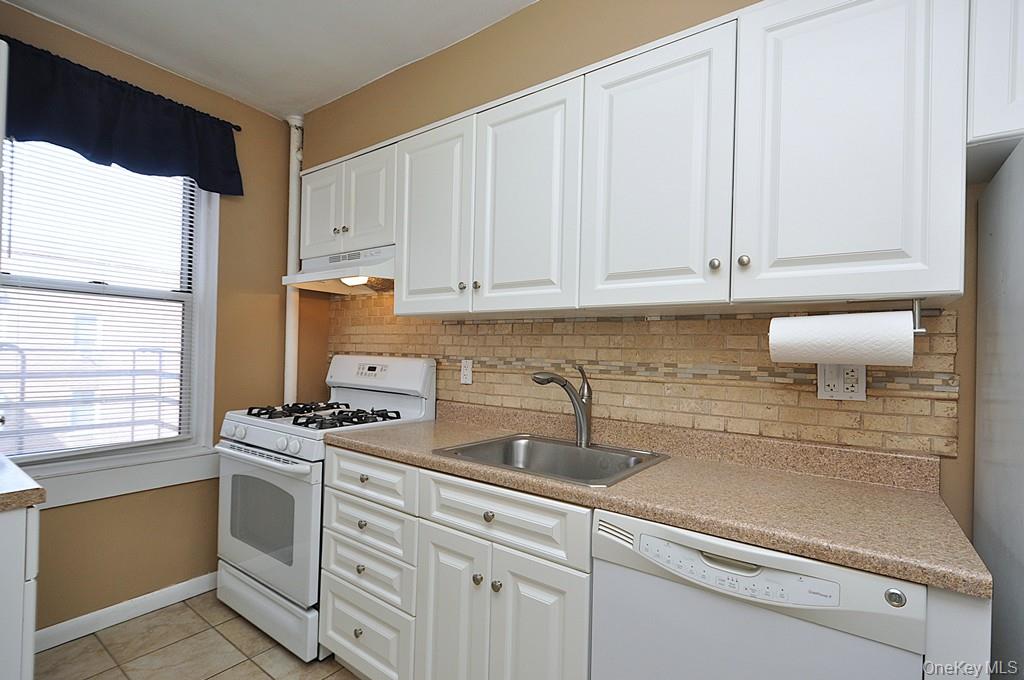 Updated Kitchen has a window for natural light and ventilation.