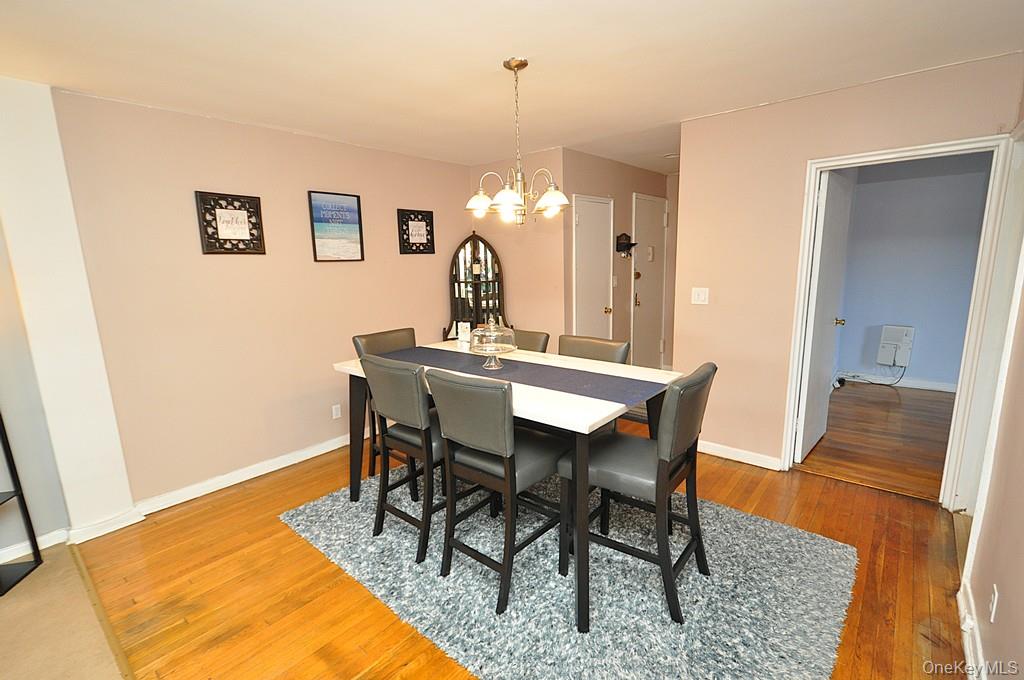 1 Vincent Road, Unit 6B Bronxville, NY 10708 - Photo 11 of 28 a dining room with furniture and window