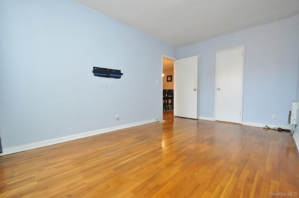 1 Vincent Road, Unit 6B Bronxville, NY 10708 - Photo 24 of 28 a view of an empty room with wooden floor