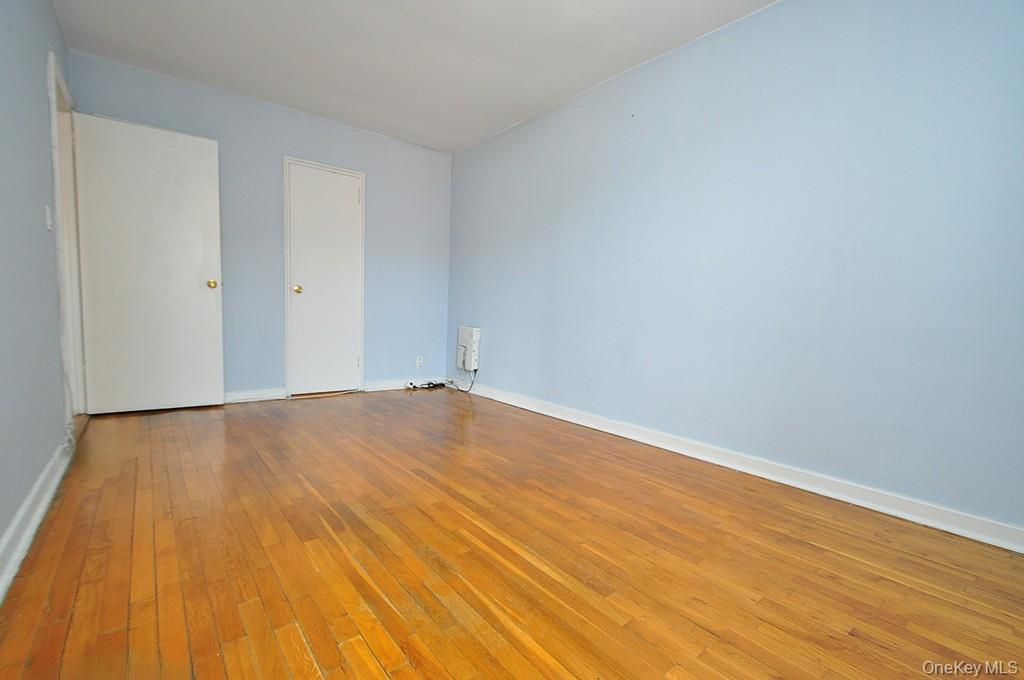 1 Vincent Road, Unit 6B Bronxville, NY 10708 - Photo 25 of 28 a view of empty room with wooden floor