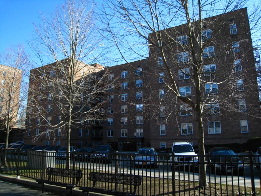 1 Vincent Road, Unit 6B Bronxville, NY 10708 - Photo 26 of 28 a view of house with outdoor space and covered with snow in the background