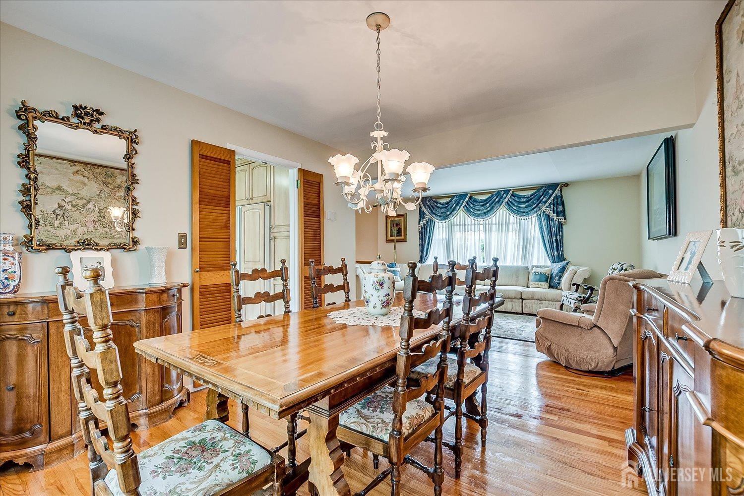 807 New Dover Road Edison, NJ 08820 - Photo 13 of 41 a view of a dining room with furniture window and wooden floor