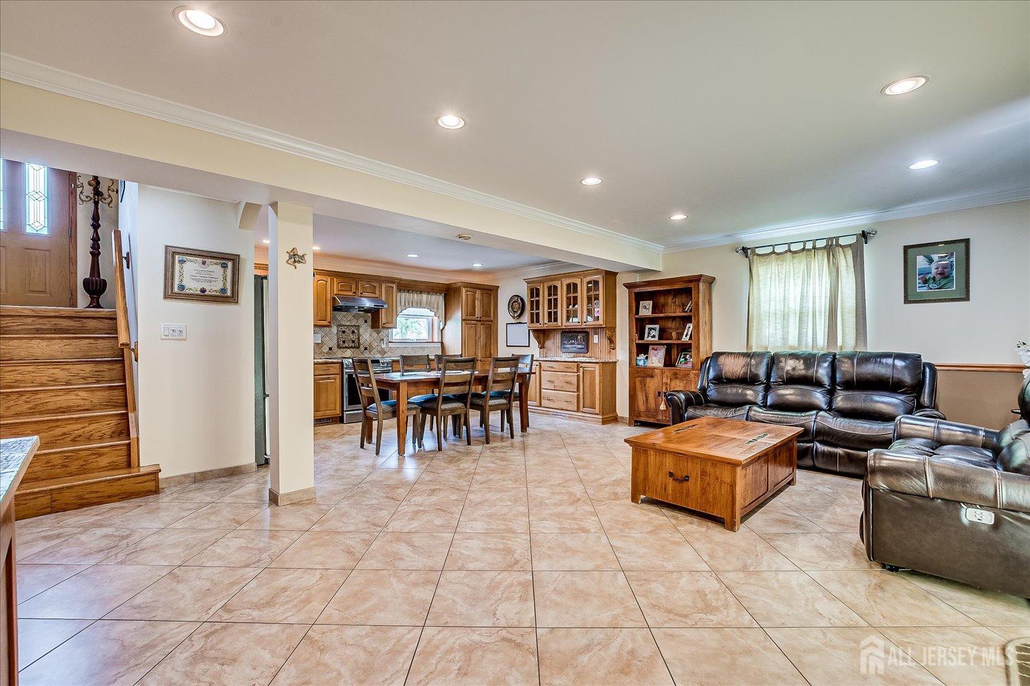 807 New Dover Road Edison, NJ 08820 - Photo 29 of 41 a living room with furniture and a table
