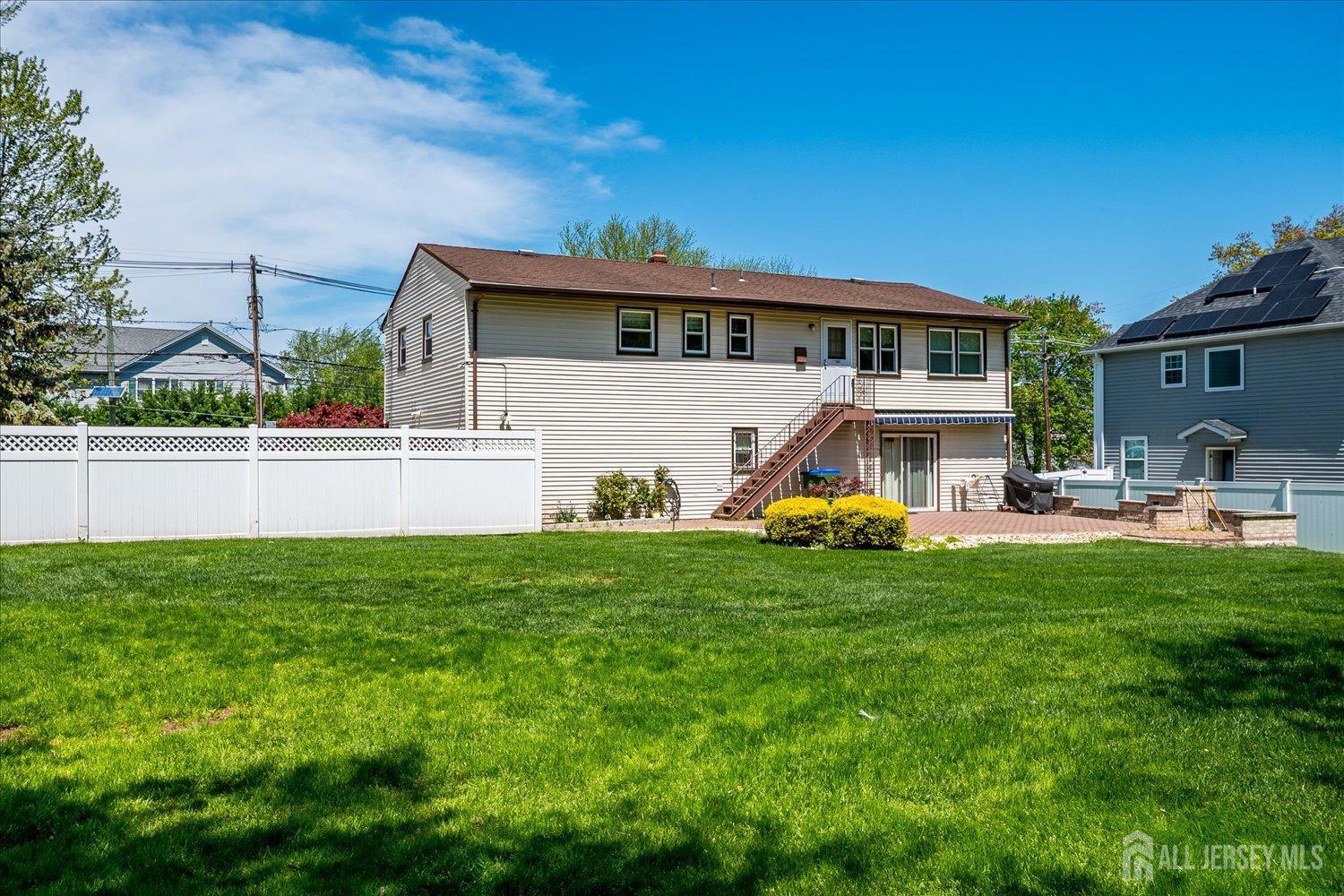 807 New Dover Road Edison, NJ 08820 - Photo 39 of 41 a view of a house with a backyard