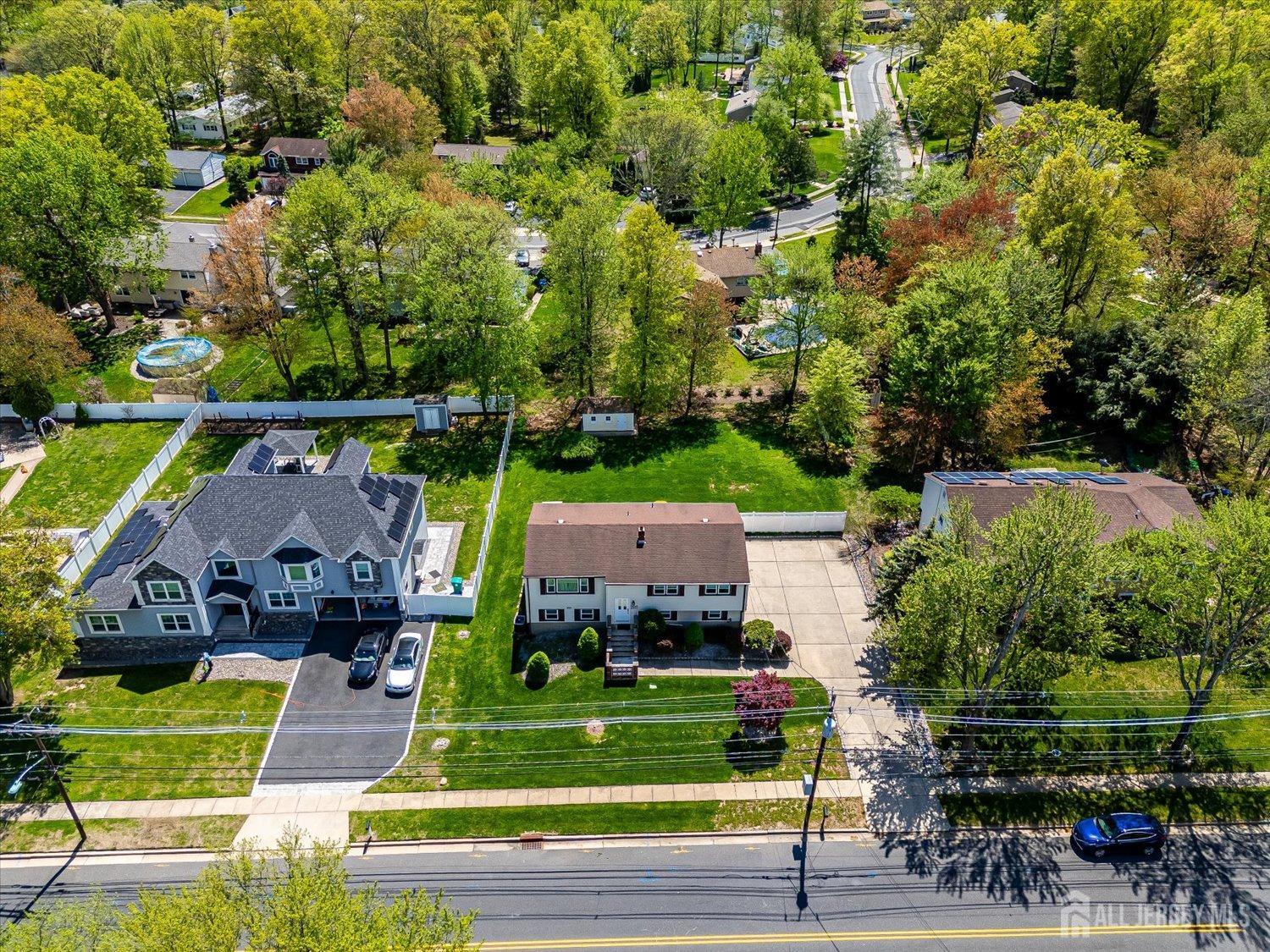 807 New Dover Road Edison, NJ 08820 - Photo 5 of 41 an aerial view of a house with a garden