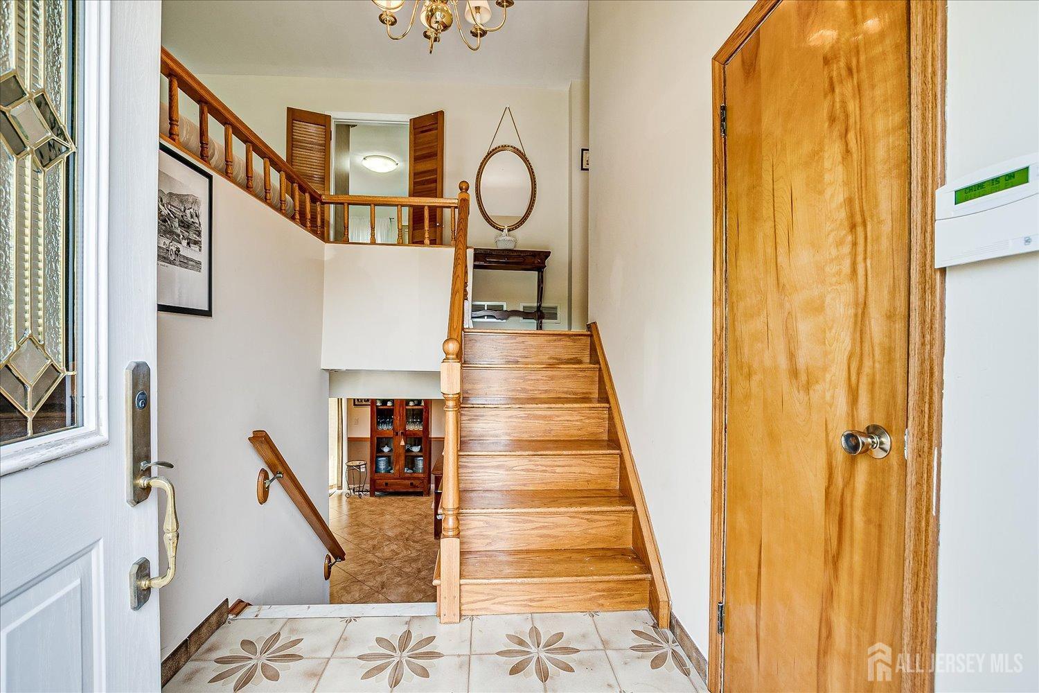 807 New Dover Road Edison, NJ 08820 - Photo 7 of 41 a view of a stairs and an entryway