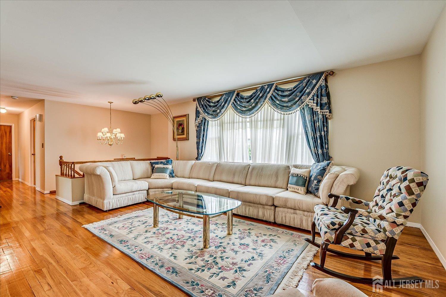 807 New Dover Road Edison, NJ 08820 - Photo 10 of 41 a living room with furniture and a rug