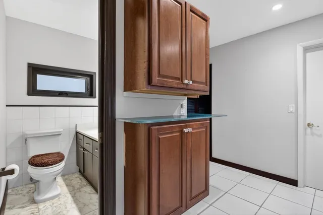 a bathroom with a bathtub and shower