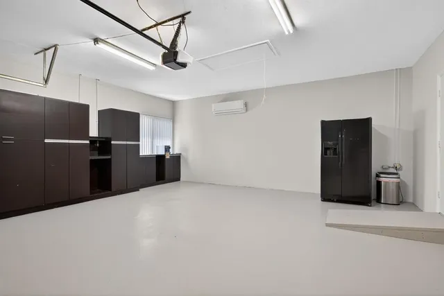 a bedroom with a bed and a piano