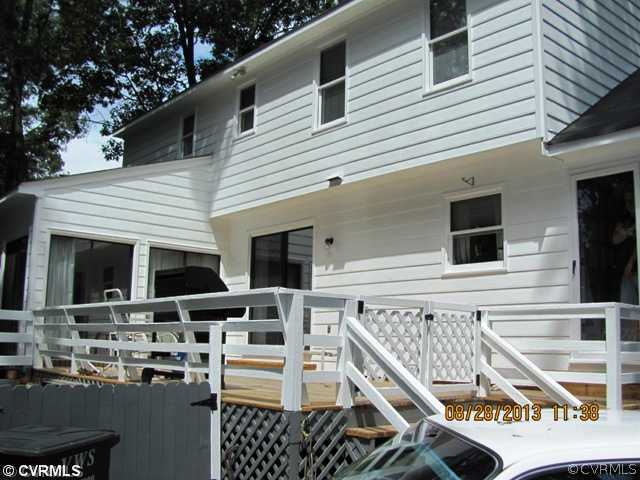3425 Ludgate Road Chester, VA 23831 - Photo 3 of 16 a balcony with furniture and a flat screen tv