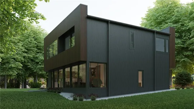 a view of a house with backyard and garden