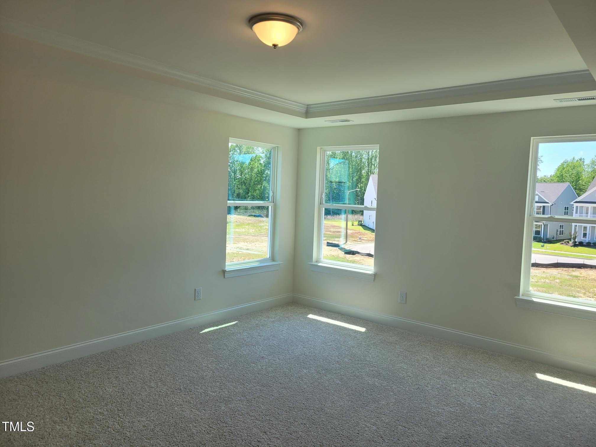 3703 Cessna Way, Unit 9 Wilson, NC 27896 - Photo 11 of 16 an empty room with windows