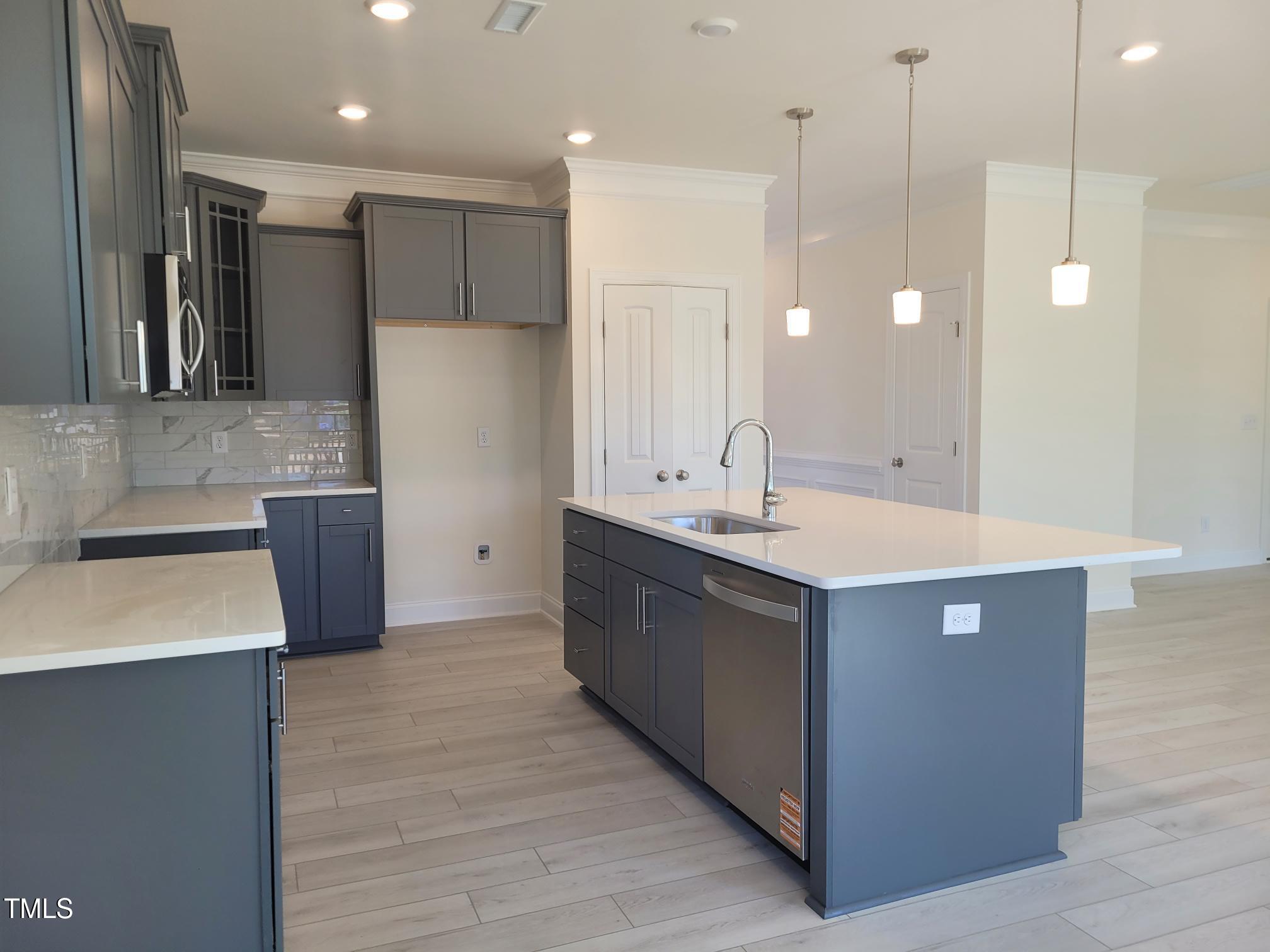 3703 Cessna Way, Unit 9 Wilson, NC 27896 - Photo 4 of 16 a bathroom with a sink a large mirror and a shower