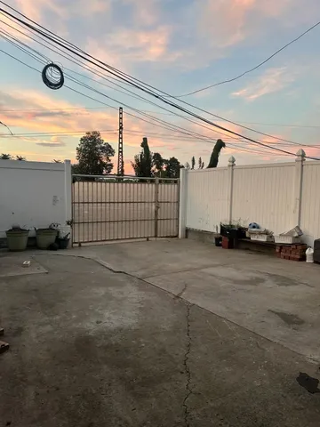 a front view of a house with parking