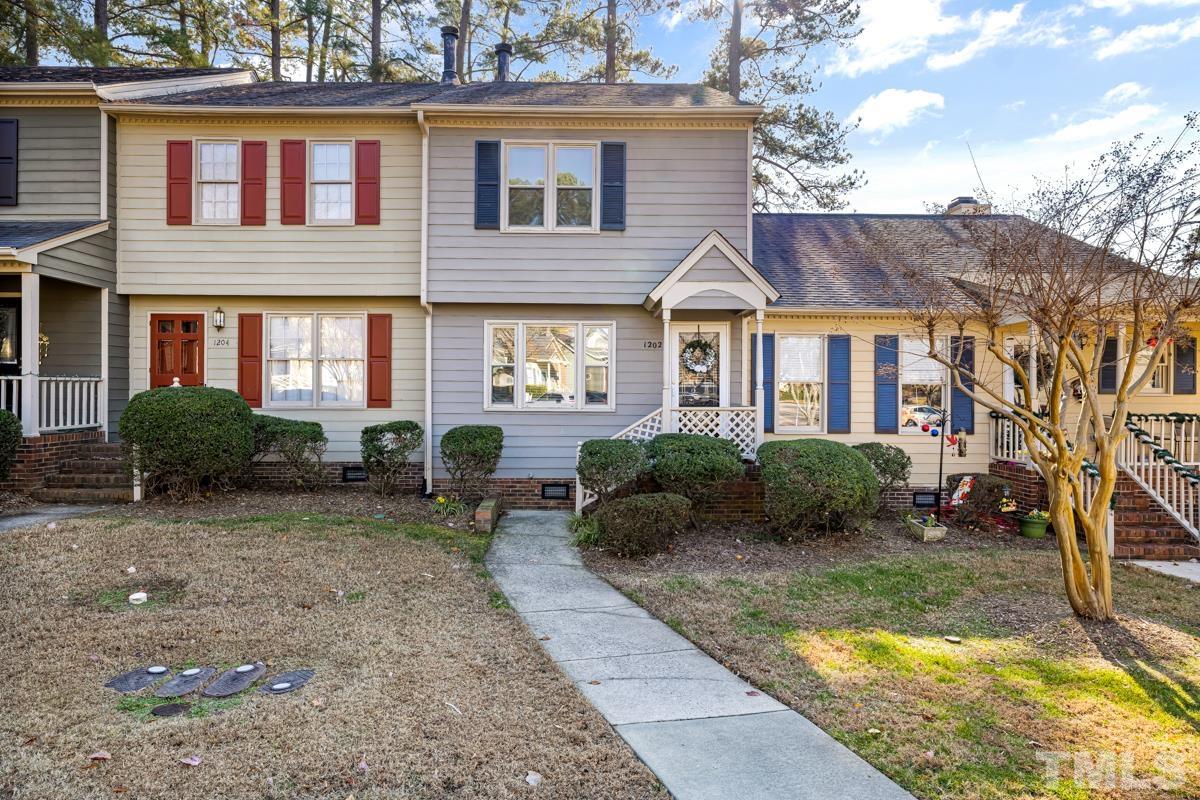 1202 Shadow Bark Court Raleigh, NC 27603 - Photo 1 of 27 a view of a house with backyard and sitting area