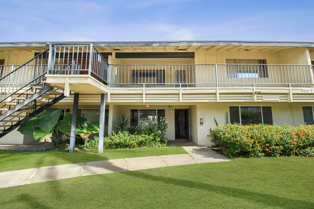 a house view with a garden space