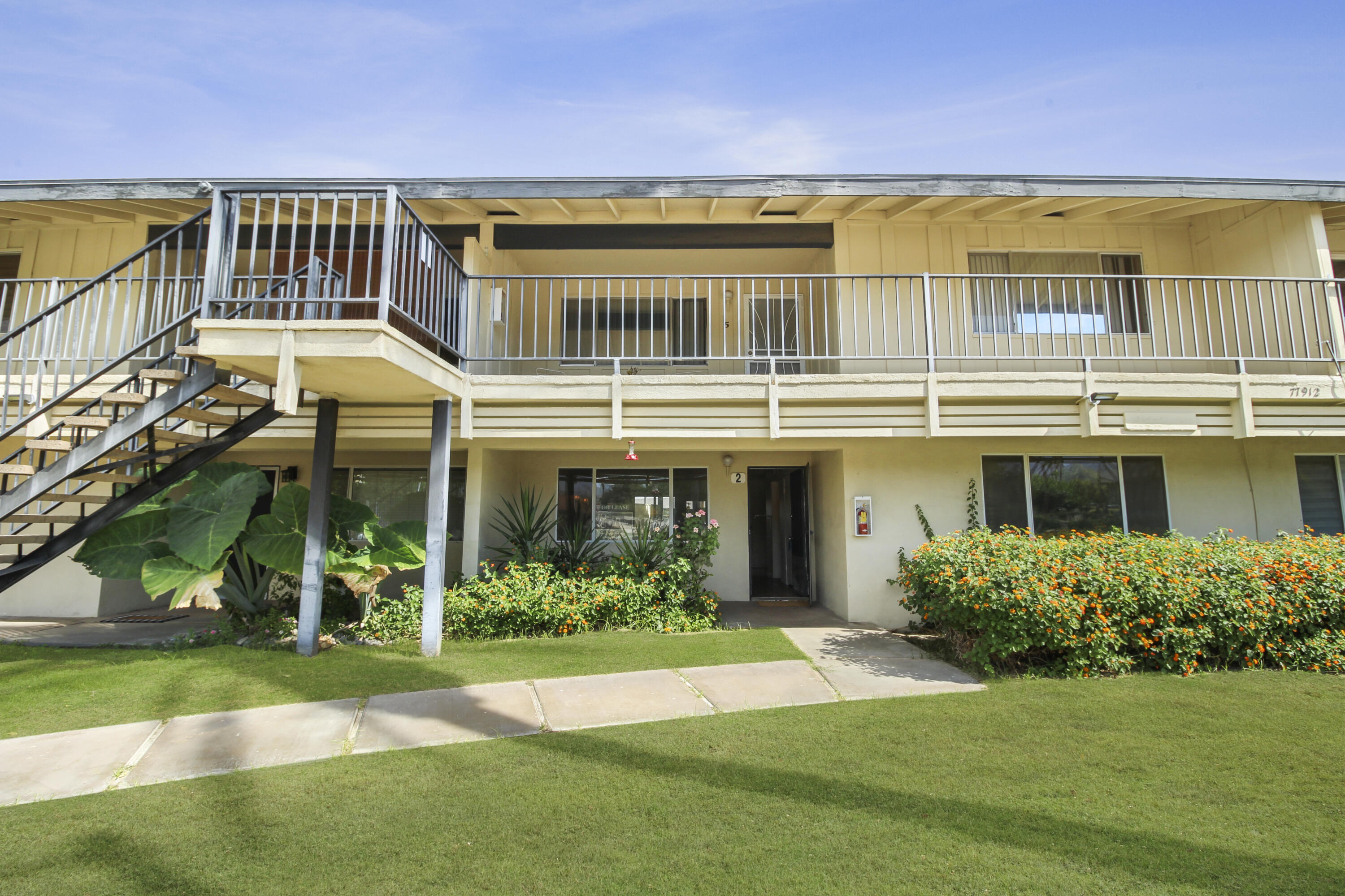 a house view with a garden space