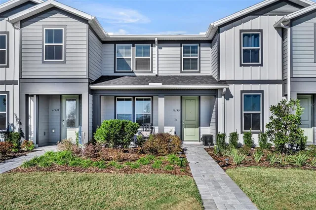 front view of a house with a yard