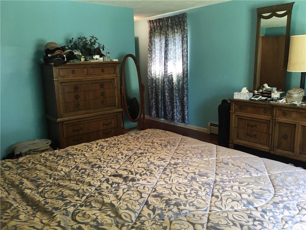 2859 Brodhead Road Aliquippa, PA 15001 - Photo 11 of 23 MASTER BEDROOM - Plenty of room for a king size bed plus your furniture. Solid hardwood floors. Master bath is to the left.