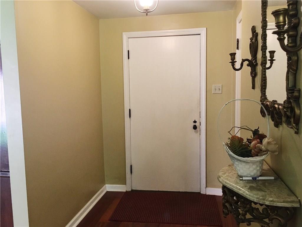 2859 Brodhead Road Aliquippa, PA 15001 - Photo 4 of 23 ENTRY - Spacious Entry area leads you into this comfortable home. There is a handy coat closet on right. The Living Room is on left. Hardwood floors carry through most of the rooms. Neutral tones in the living areas.