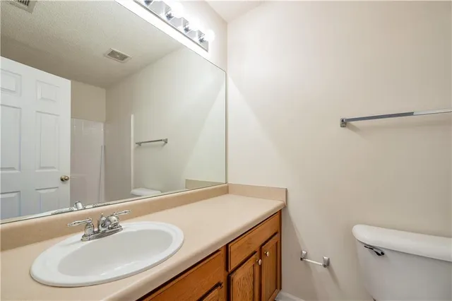 a bathroom with a sink and a toilet