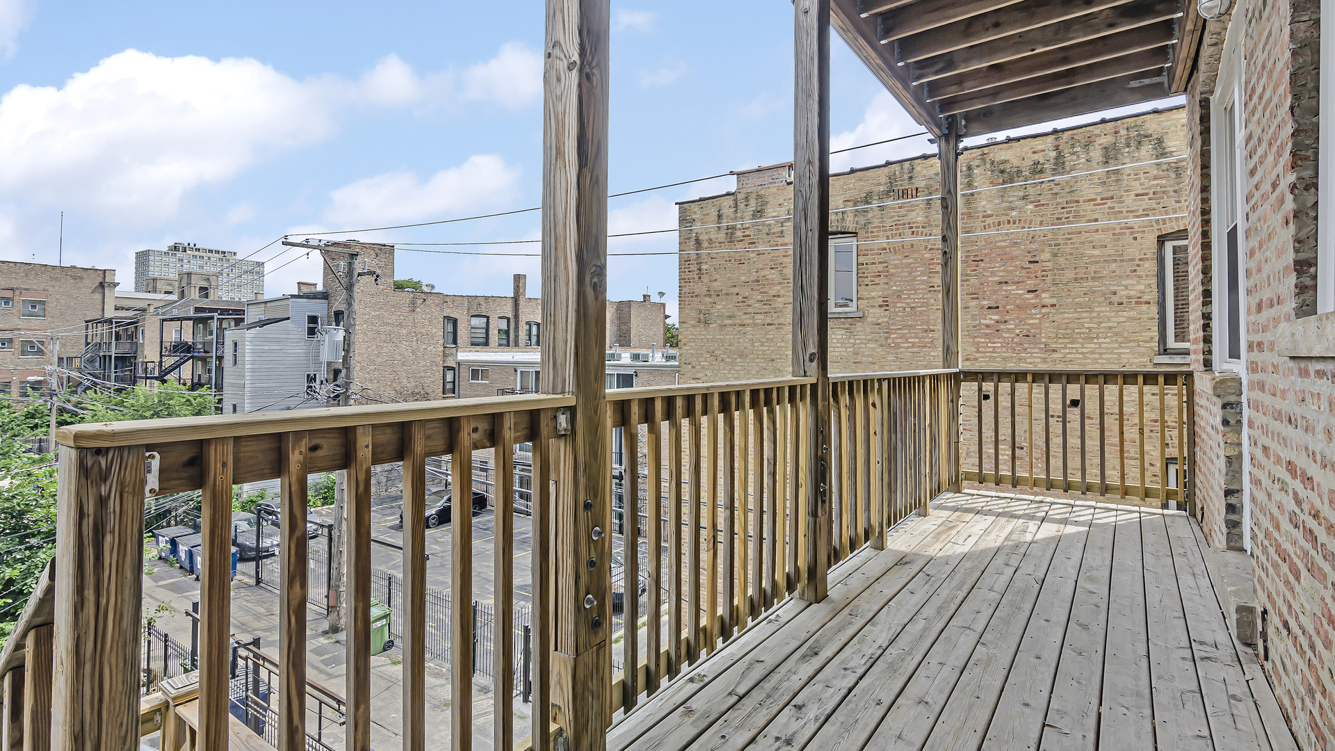 342 East 50th Street, Unit 1 Chicago, IL 60615 - Photo 14 of 16 a view of city from a balcony