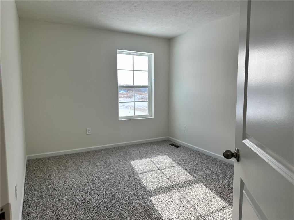121 Marginal Road Hunker, PA 15639 - Photo 17 of 34 an empty room with windows