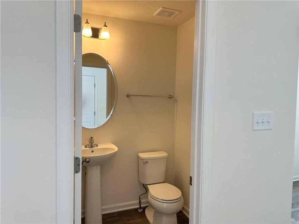121 Marginal Road Hunker, PA 15639 - Photo 10 of 34 a bathroom with a toilet and a sink