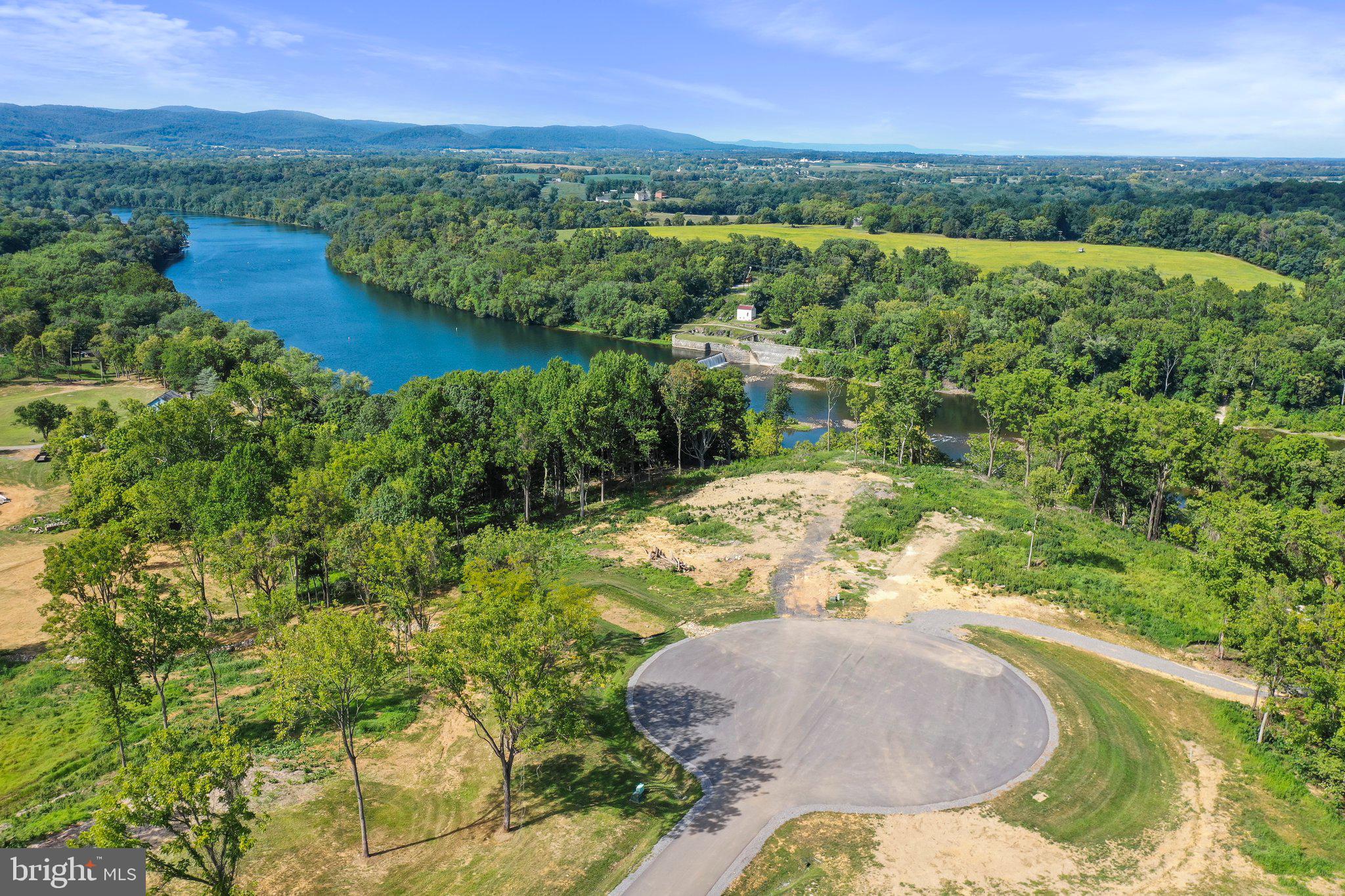 2 Bella Vista Falling Waters, WV 25419 - Photo 17 of 39 a view of a lake with a city
