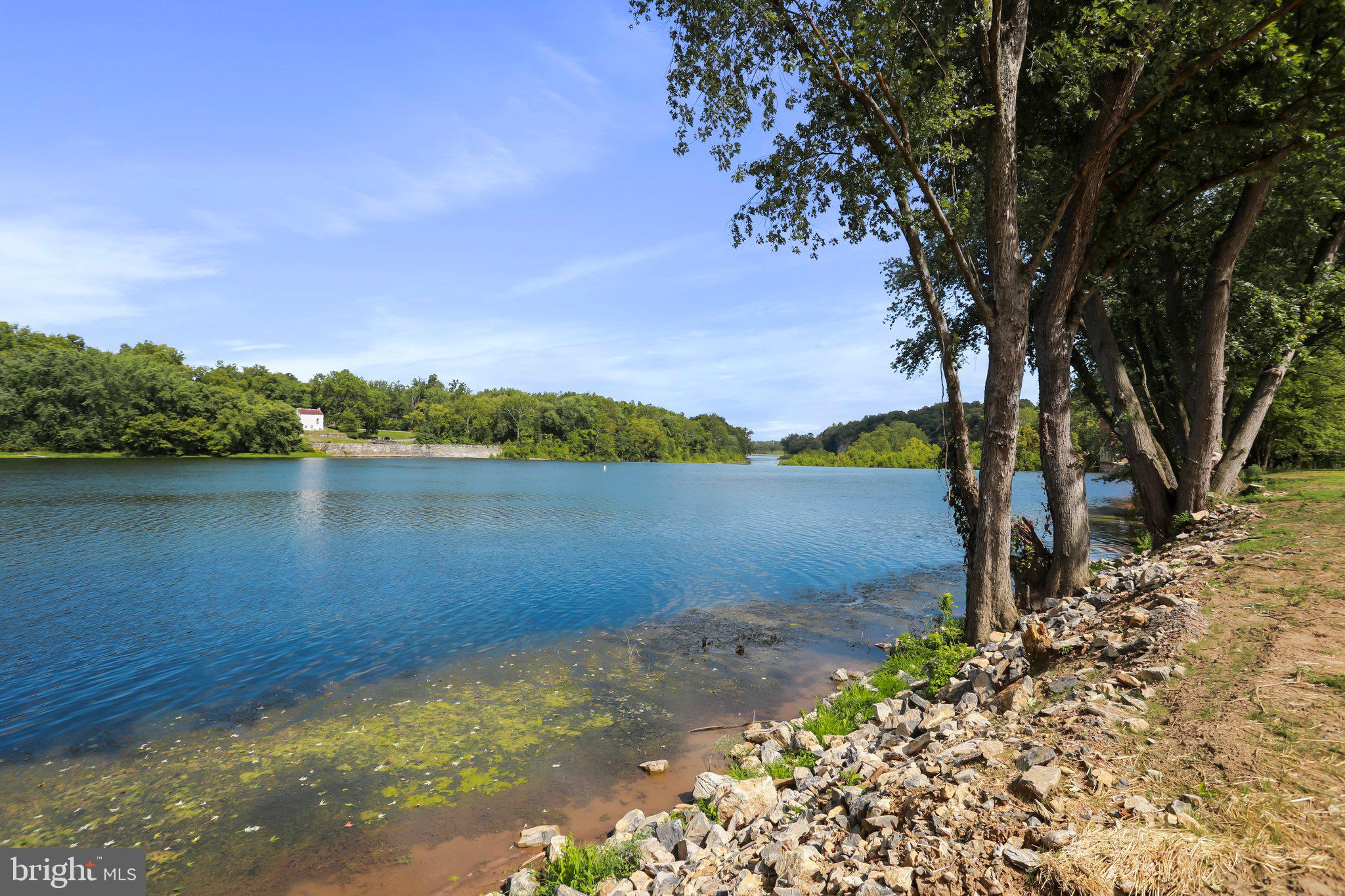 2 Bella Vista Falling Waters, WV 25419 - Photo 36 of 39 a view of a lake with a big yard