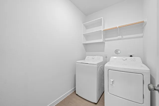 a utility room with dryer and washer