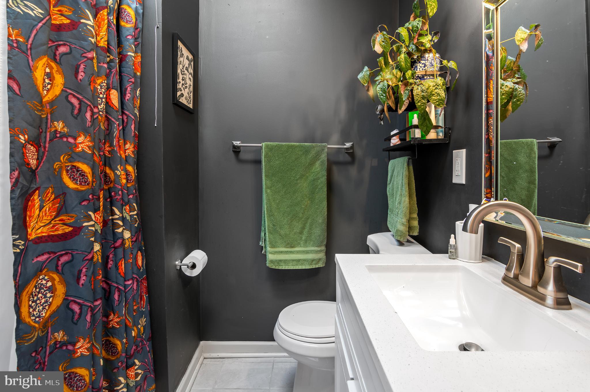 505 South Lehigh Street Baltimore, MD 21224 - Photo 14 of 25 a bathroom with a sink toilet and shower