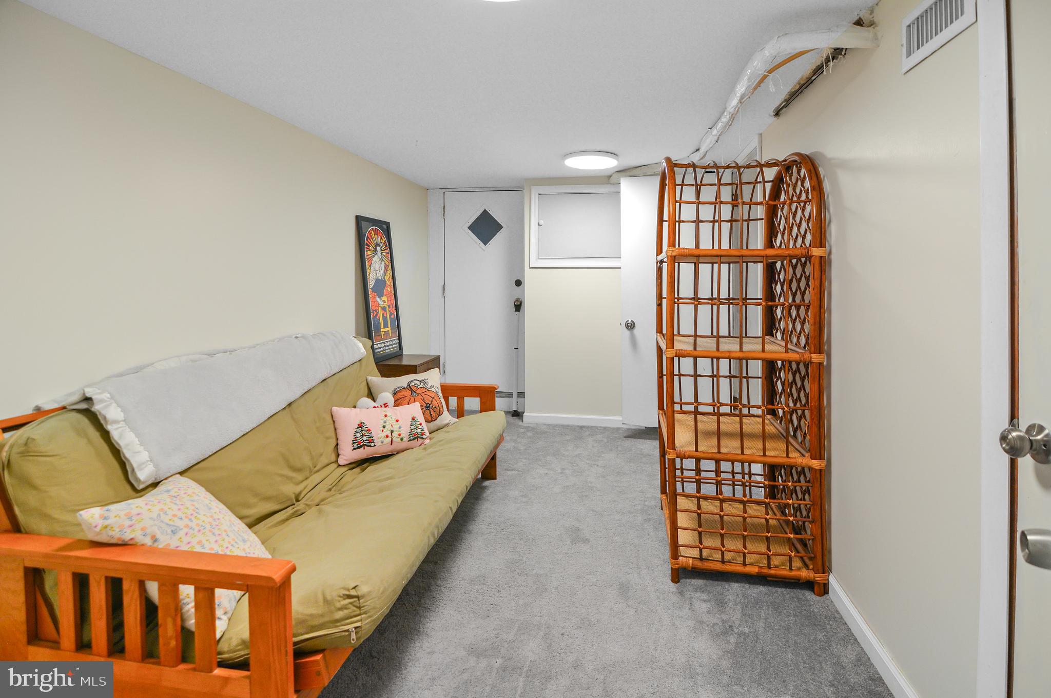 505 South Lehigh Street Baltimore, MD 21224 - Photo 20 of 25 a living room with furniture and a window