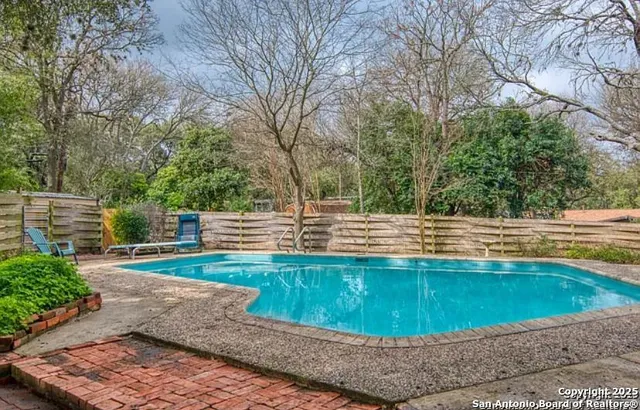 a view of outdoor space yard and swimming pool