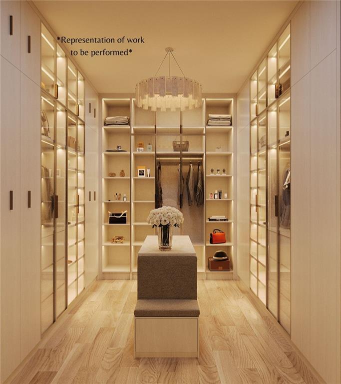 1770 Mayfield Road Alpharetta, GA 30009 - Photo 7 of 11 a bedroom with a bed and a walk in closet