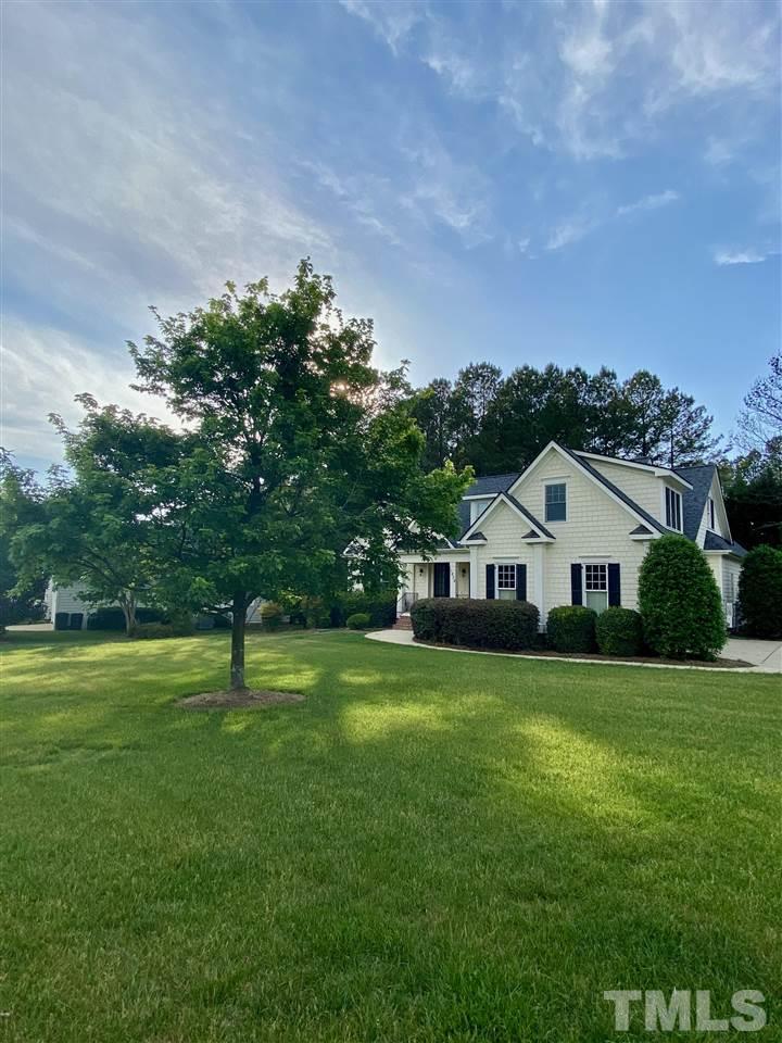 1028 Raleigh, NC 27603 - Photo 2 of 24 a front view of a house with a yard