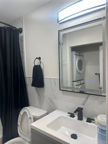 a bathroom with a shower and bathtub