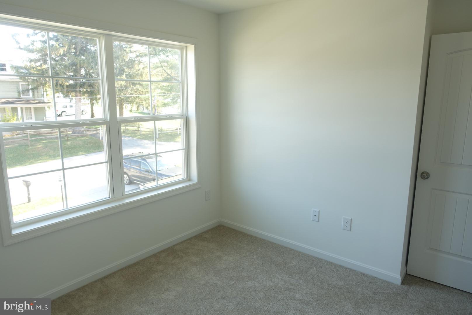 221 Kinneman Road, Unit 28 Abbottstown, PA 17301 - Photo 20 of 26 an empty room with a window