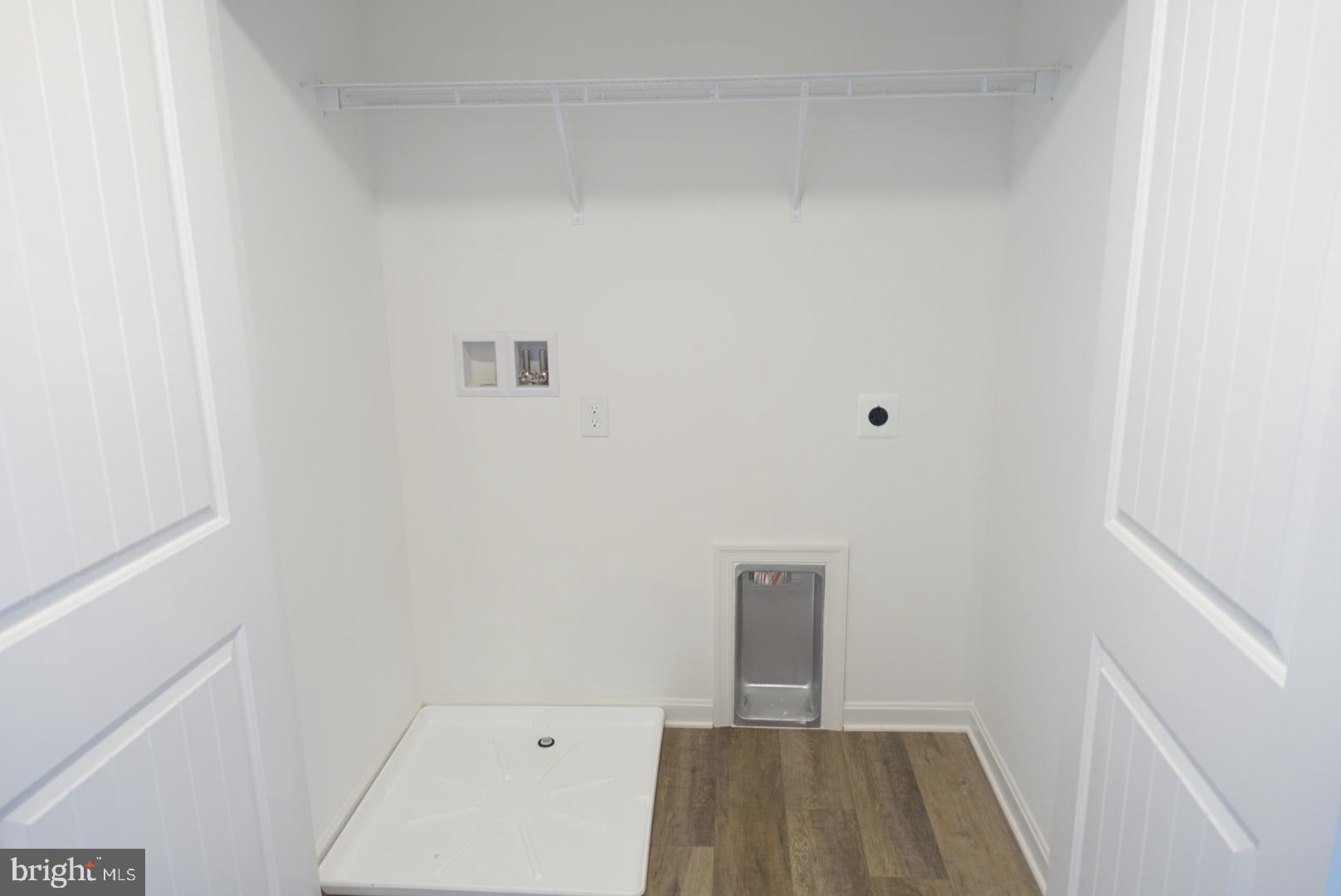 221 Kinneman Road, Unit 28 Abbottstown, PA 17301 - Photo 22 of 26 a view of hallway with wooden floor