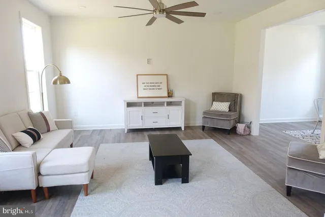 a living room with furniture and a couch