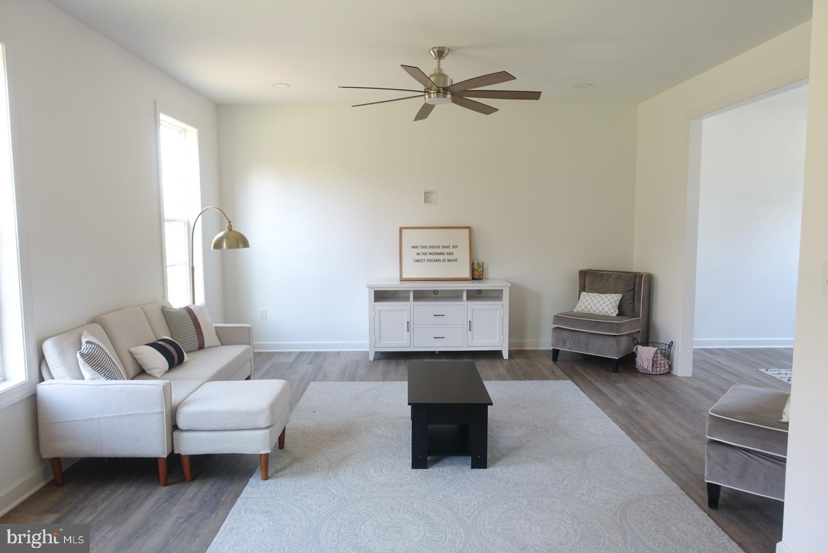 221 Kinneman Road, Unit 28 Abbottstown, PA 17301 - Photo 9 of 26 a living room with furniture and a couch