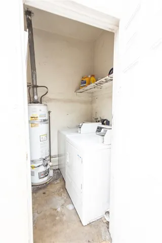 a bathroom with a sink toilet and a mirror