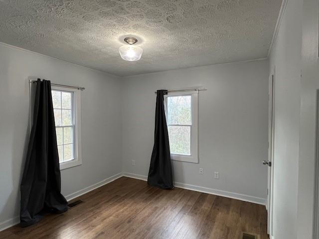 5850 Old Bill Cook Road, Unit FRONT Atlanta, GA 30349 - Photo 11 of 19 an empty room with wooden floor and window