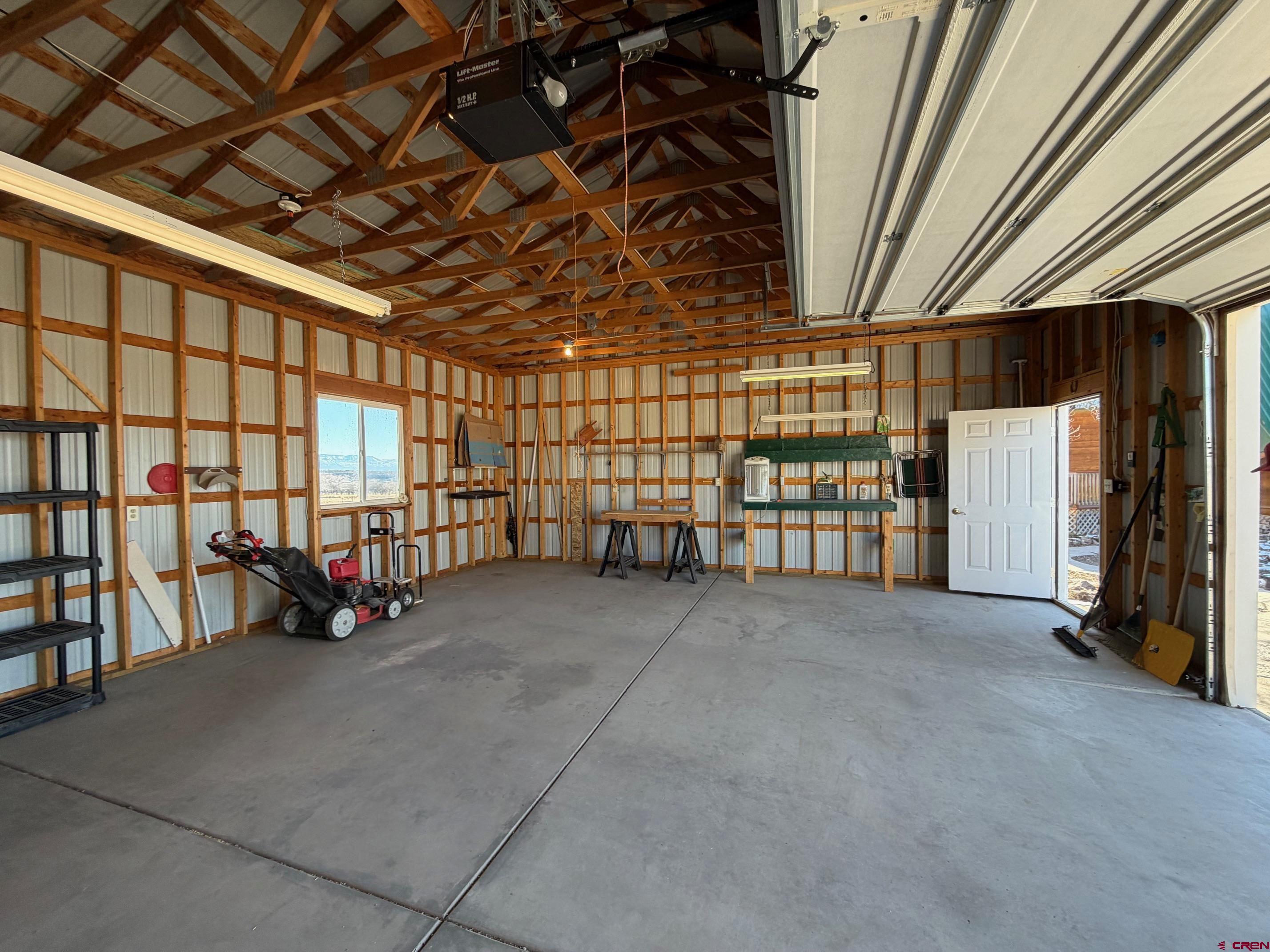 25926 Q25 Road Cedaredge, CO 81413 - Photo 27 of 32 a view of an empty room with windows