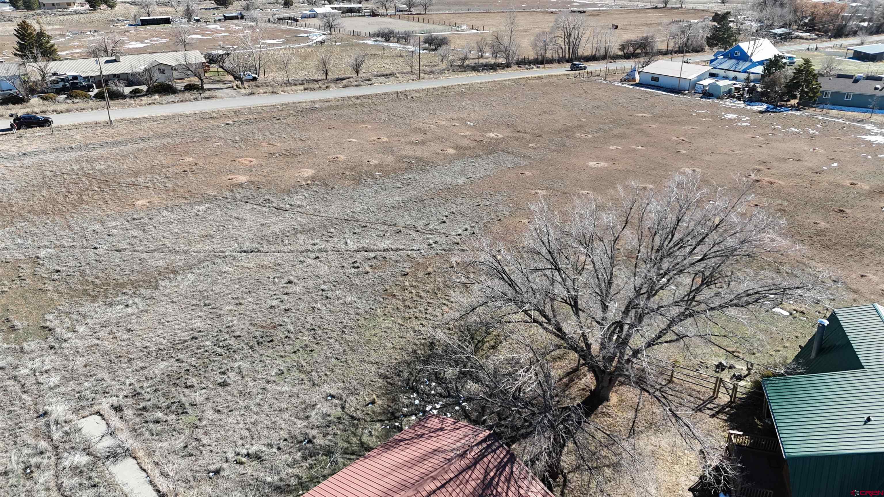 25926 Q25 Road Cedaredge, CO 81413 - Photo 29 of 32 a view of a parking area with a bench