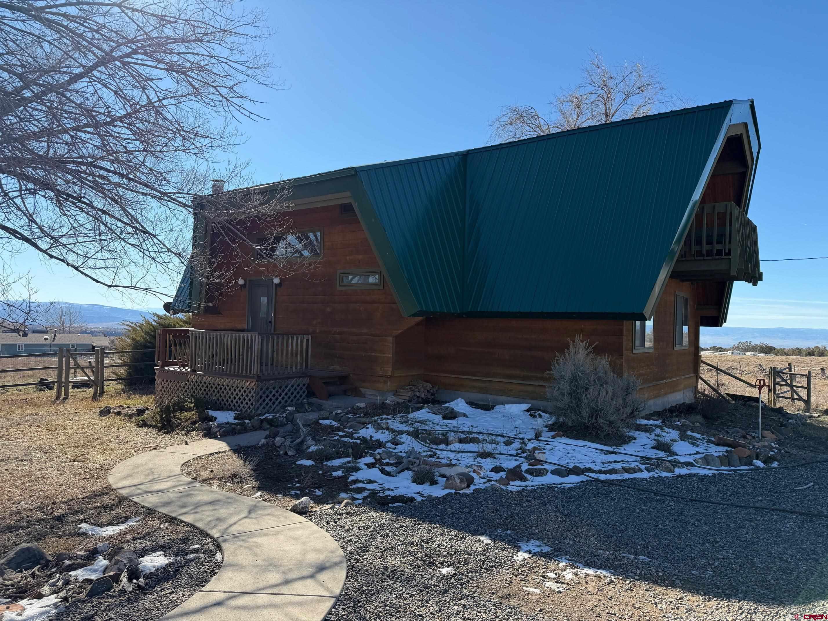 25926 Q25 Road Cedaredge, CO 81413 - Photo 32 of 32 a backyard of a house with lots of green space