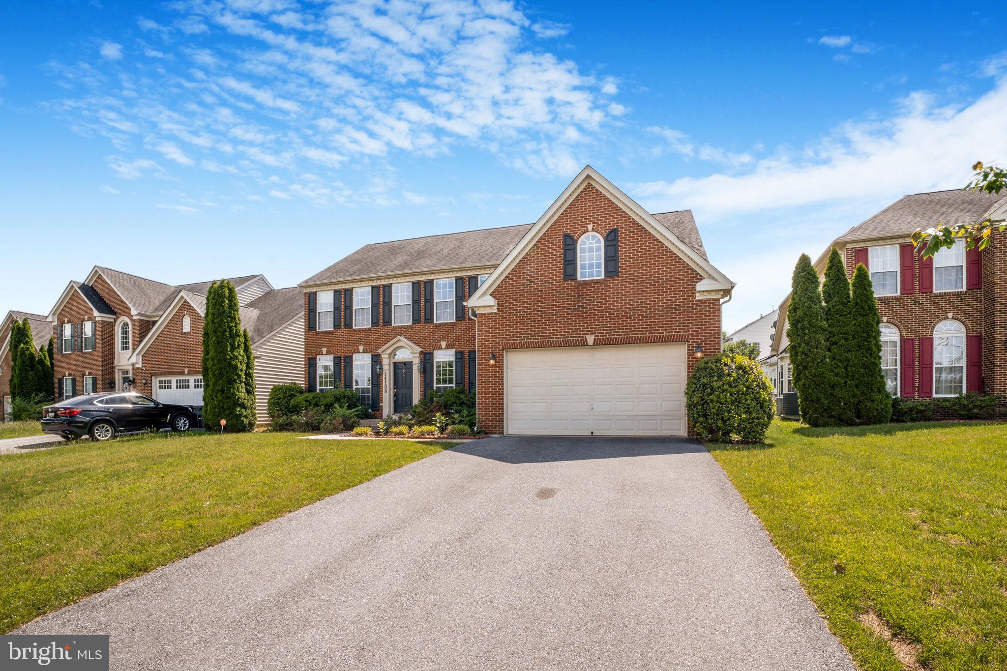 14108 Chivas Circle Laurel, MD 20707 - Photo 1 of 51 a front view of house with yard and green space